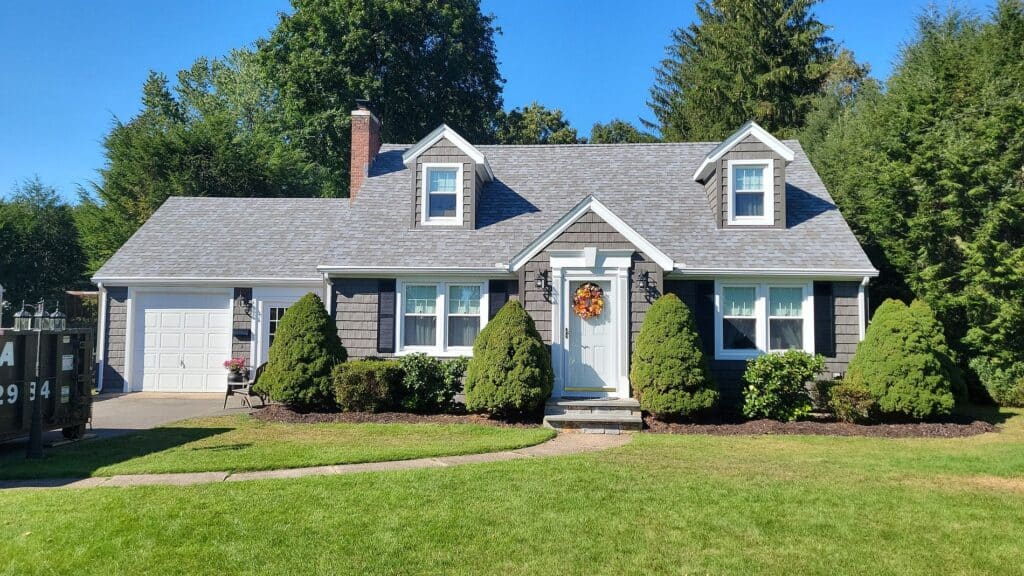 grey siding with white window trim